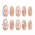 Blush Crystal Garden handmade press-on nails with pink 3D flowers, clear hearts, pearls and gold beads