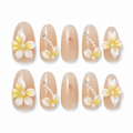Lemon Blossom handmade press-on nails with yellow flowers, pearls and nude shimmer